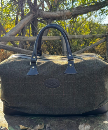 bolso de viaje en tweed y piel